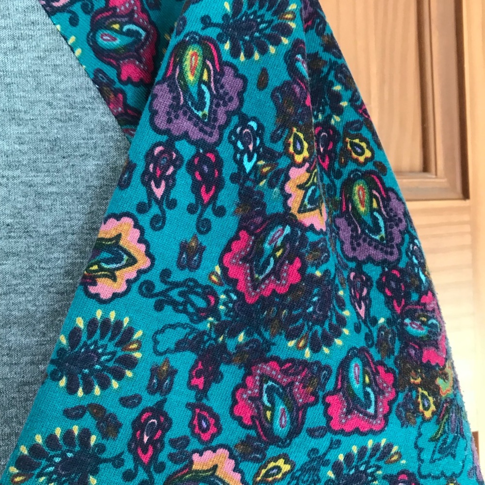 Grey Julia with teal sleeves and flower pattern